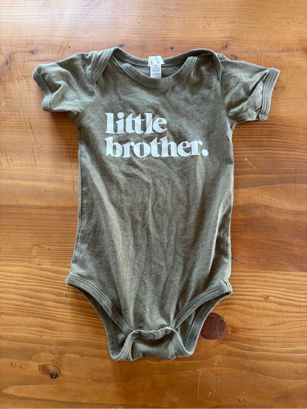 Bella Canvas Olive Green Baby Onesie with White Text